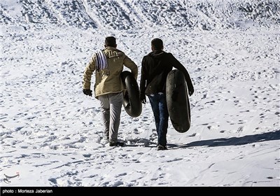 Iranian People Enjoying Winter in Snowy Mountains