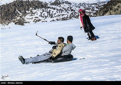 Iranian People Enjoying Winter in Snowy Mountains