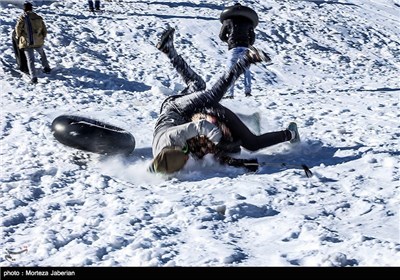 Iranian People Enjoying Winter in Snowy Mountains