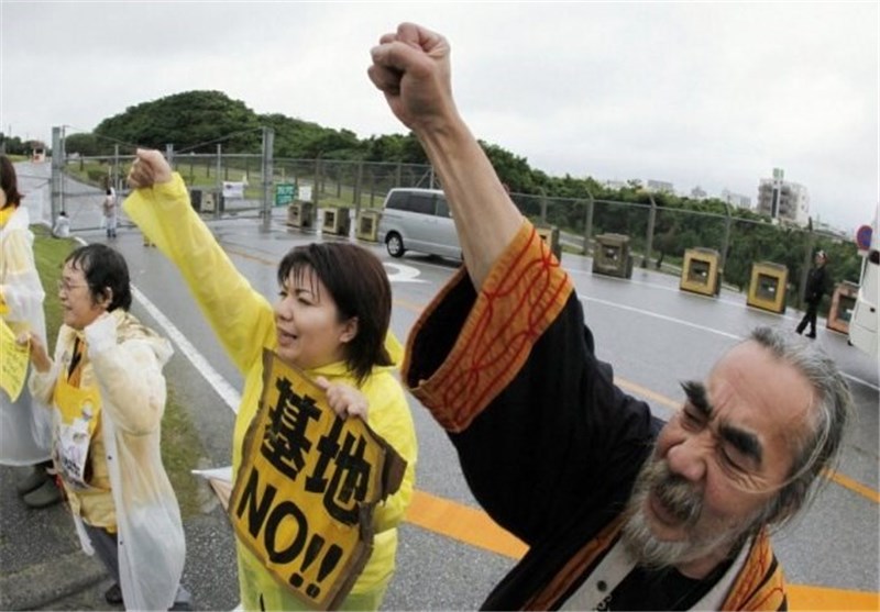 Thousands Surround Japan&apos;s Parliament in Protest against US Military Base in Okinawa