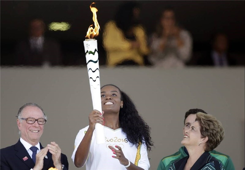 Olympic Torch Arrives in Brazil to Cheers and Jeers