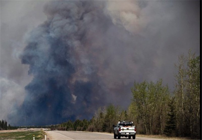 Weather Aids Firefighters Battling Blaze In Canada Oil Region Other