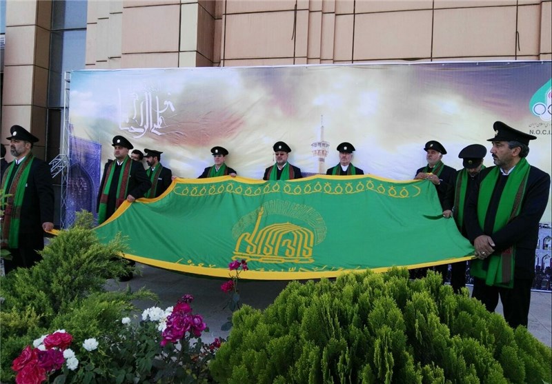 مراسم اهتزاز پرچم امام رضا (ع) در کمیته ملی المپیک برگزار شد