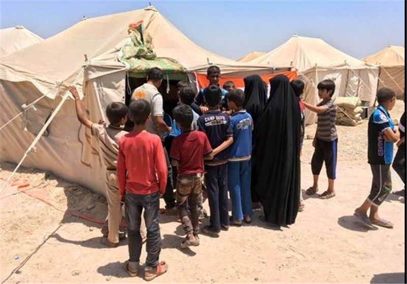1000s Flee Fallujah Using Route Secured by Iraqi Army