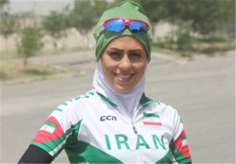 Iranian Skier Forough Abbasi Carries Winter Olympic Torch