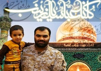 لحظه وداع شهید مدافع حرم با فرزندش