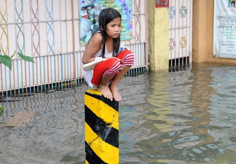 سیل در فیلیپین جان 5 نفر را گرفت/ دست‌کم 70 هزار نفر آواره شده‌اند+عکس