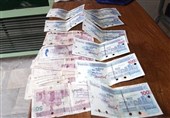 عاملان توزیع چک پول‌های تقلبی در کرمانشاه دستگیر شدند