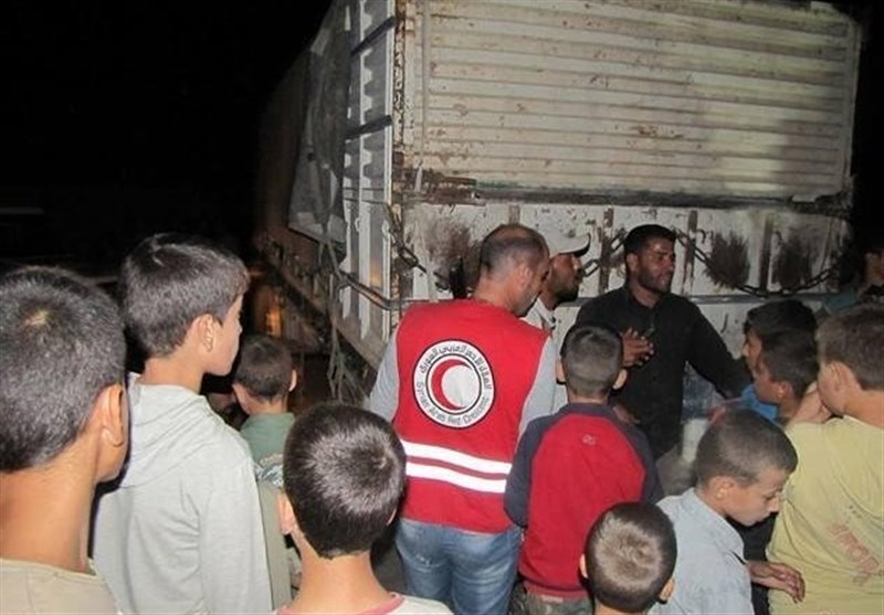 Aid Reaches Residents of 4 Besieged Syrian Towns (+Photos)