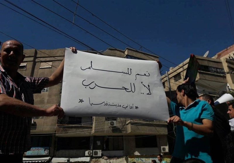 اتفاق مصالحة جدید فی بلدتی قدسیا والهامة بریف دمشق +صور