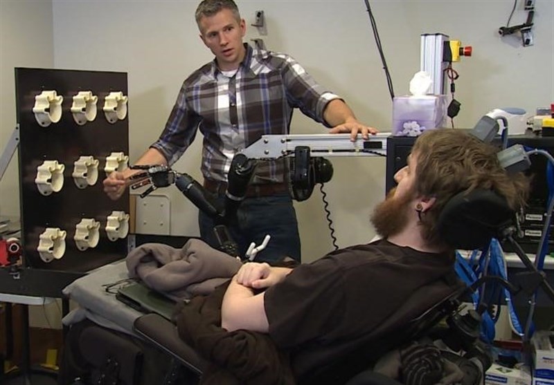 Mind-Controlled Robotic Arm Gives Sense of Sensation to Paralyzed Man