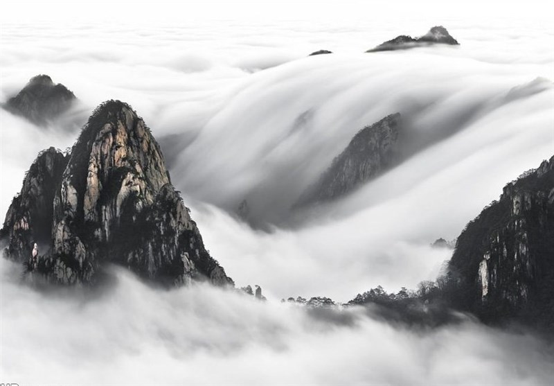تصویری حیرت‌انگیز از کوه‌های پوشیده شده با ابر در چین