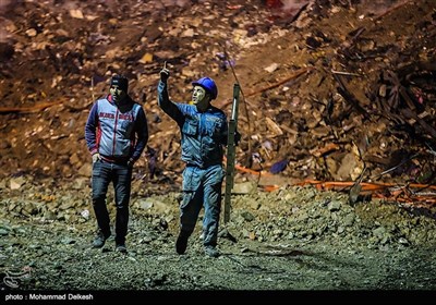 Night-Shift Rescuers Keep Clearing Plasco Building Debris 