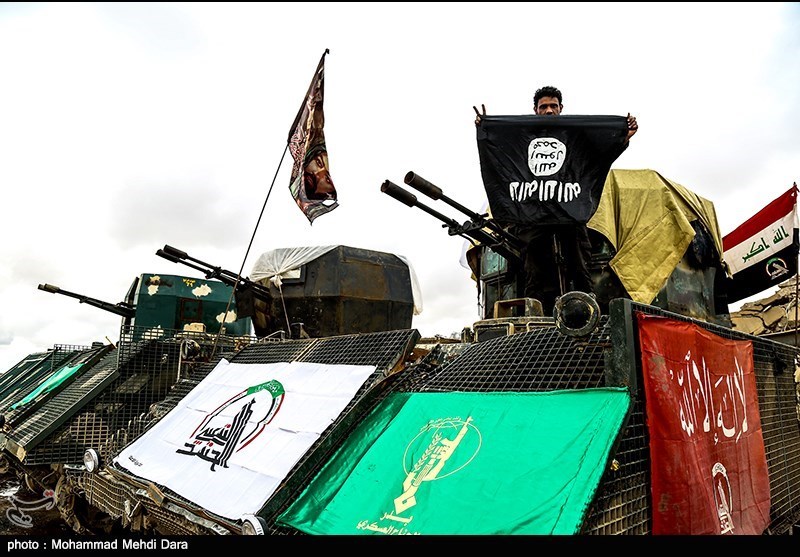 تصاویر آرایش نظامی حشد شعبی در «تلعفر» / واکنش جالب رزمنده عراقی به نماد داعش