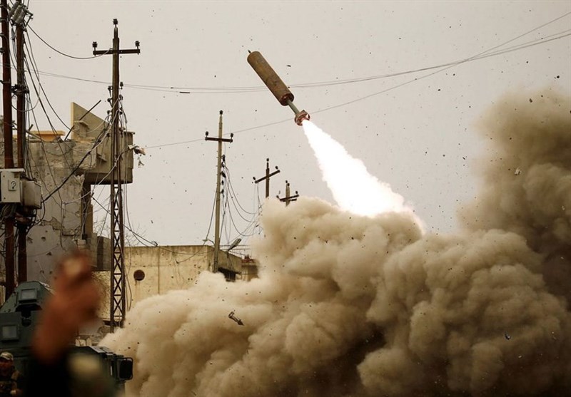 عکس / شلیک موشک به مواضع داعش در موصل