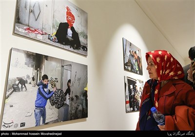 نمایشگاه عکس «عشق و آتش» کار گروهی عکاسان باشگاه خبرنگاران پویا(تسنیم)