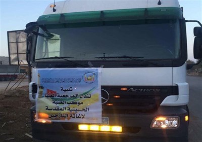 الحشد الشعبی العراقی یرسل أکبر قافلة مساعدات إلى الموصل
