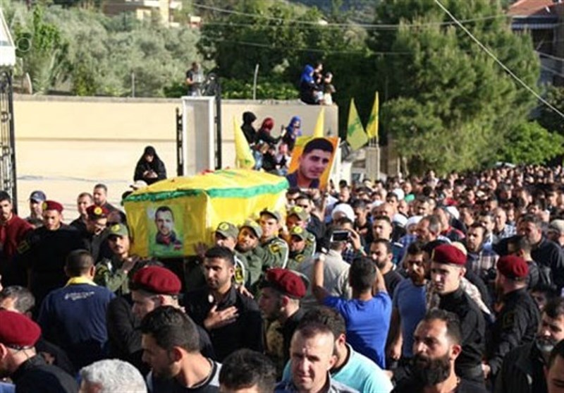 تشییع پیکر شهید مدافع حرم حزب‌الله لبنان پس از یک سال+عکس