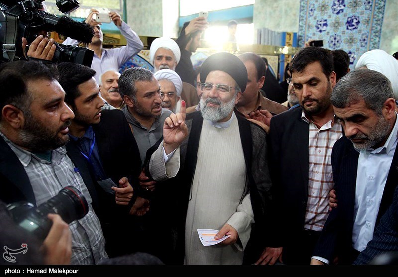 Iranian Presidential Hopeful Raisi Casts Vote (+Photos, Video)