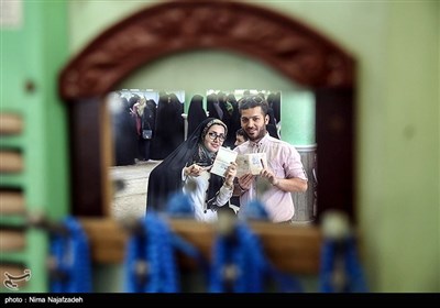 People in Iran’s Mashhad Vote in Presidential Election