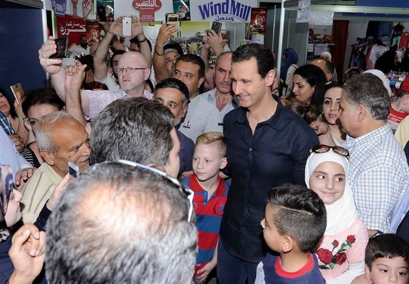 حضور غیرمنتظره «بشار اسد» در جشنواره خرید کالا در دمشق + فیلم و تصاویر