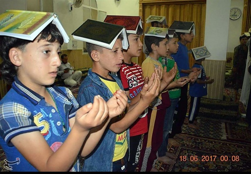 احیاء شب قدر در «نبل و الزهراء»/کودکان شیعه مظلوم سوری در کنار رزمندگان قرآن به سر گرفتند +تصاویر