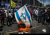 هاآرتص: پرچم و آدمک رهبران اسرائیل در تظاهرات تهران به آتش کشیده شد