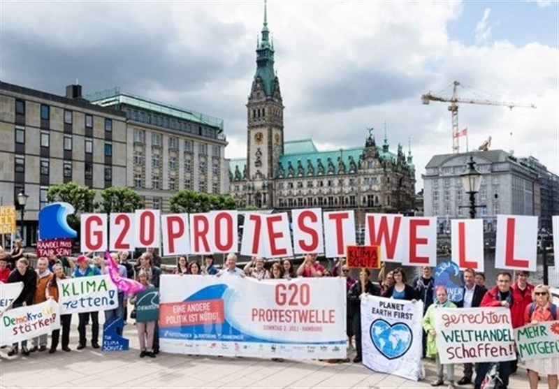Activists Protest for Legal Migration Policies ahead of G20