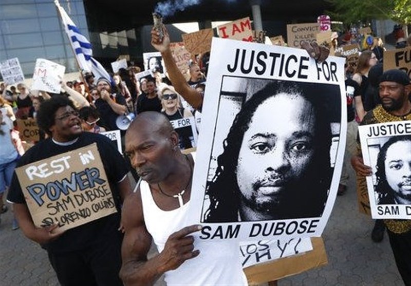 Dozens of Protesters Demand 3rd Trial in Police Shooting