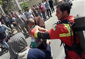 نجات 16 نفر از میان آتش و دود + تصاویر