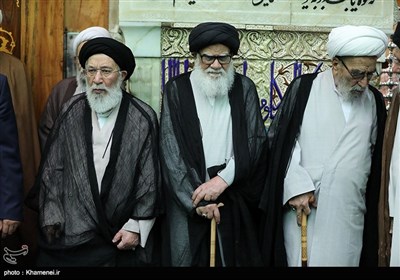 Leader Performs Dust Clearing Rite at Imam Reza's (AS) Shrine