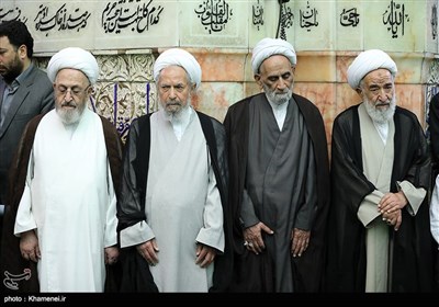 Leader Performs Dust Clearing Rite at Imam Reza's (AS) Shrine