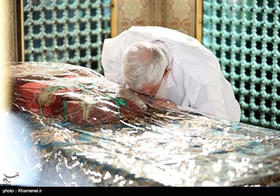 Leader Performs Dust Clearing Rite at Imam Reza's (AS) Shrine