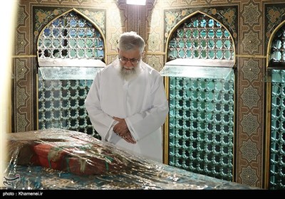 Leader Performs Dust Clearing Rite at Imam Reza's (AS) Shrine