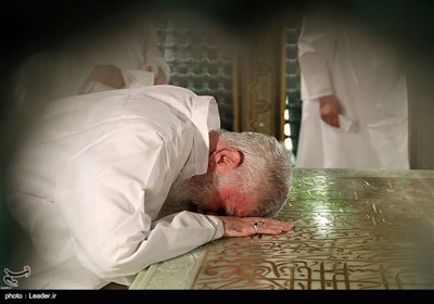 Leader Performs Dust Clearing Rite at Imam Reza's (AS) Shrine