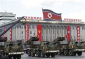 North Korea Stages Show of Force with New Missiles during Parade