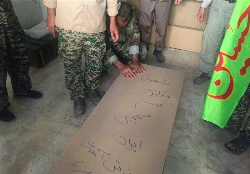 Hezbollah Receives Body of Iranian Martyr from Daesh
