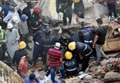 34 کشته و 32 زخمی بر اثر ریزش ساختمان+فیلم و عکس