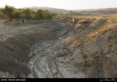آثار بجامانده از سیلاب مردادماه96 در روستای راز خراسان شمالی که به مراتع کشاورزی آسیب جدی وارد کرده است