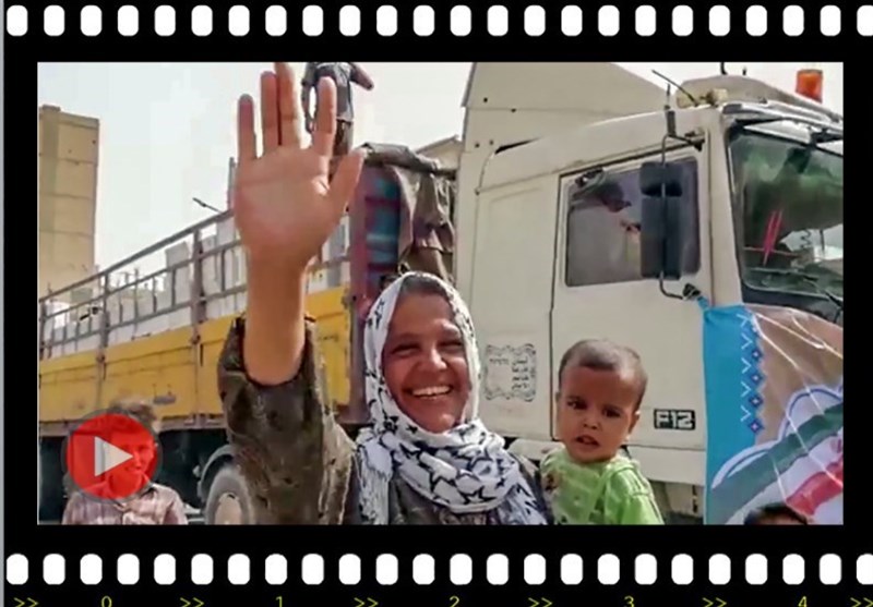 أهالی مدینة حلب یرحبون بقافلة المساعدات الإنسانیة المقدمة من الشعب الایرانی + فیدیو