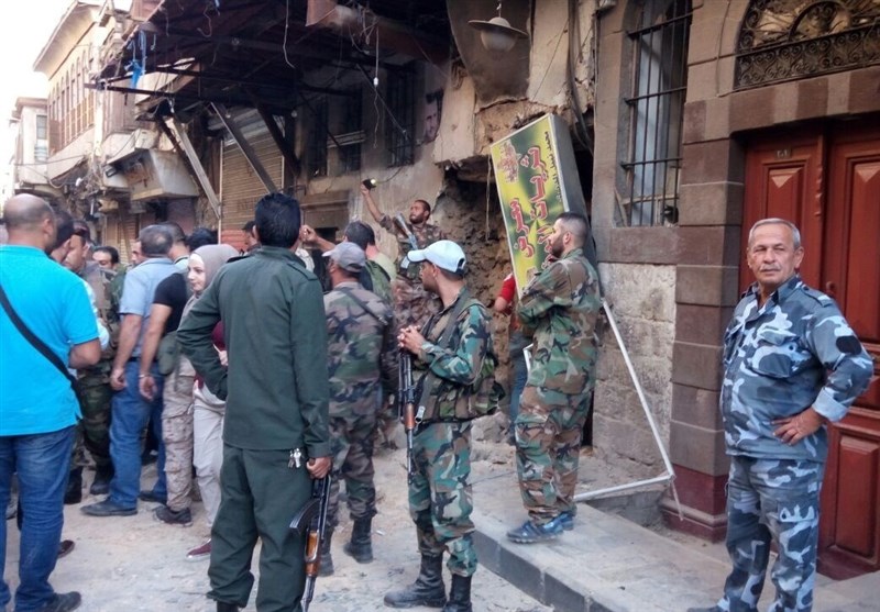 انتحاریان یفجران أحزمتهما الناسفة قرب قیادة شرطة دمشق+ صور