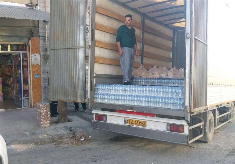 80 کامیون کمک‌های مردمی کامیاران به کرمانشاه ارسال شد+تصاویر