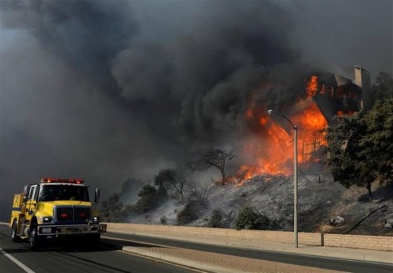 Winds Churn Unrelenting California Wildfire