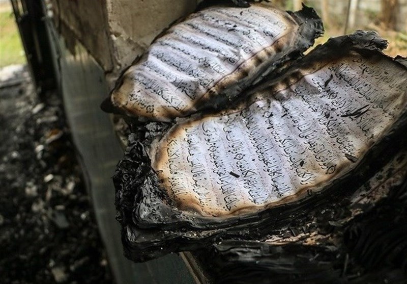 آتش زدن قرآن کریم توسط اغتشاشگران + تصاویر