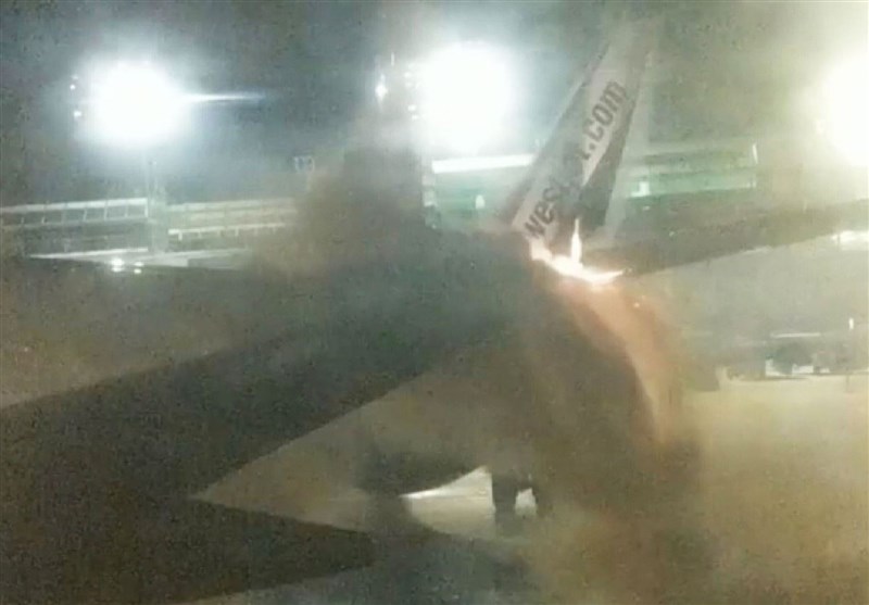 برخورد دو هواپیما در کانادا منجر به آتش‌سوزی شد+عکس