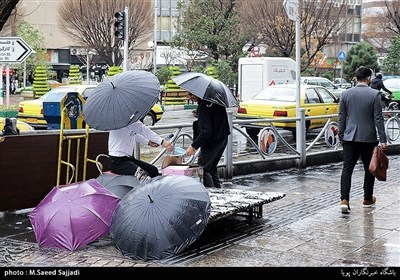 تہران میں بارش کے بعد خوشگوار موسم