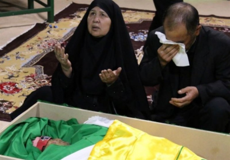 وداع با دومین شهید مدافع حرم از یک خانواده فاطمیون+عکس