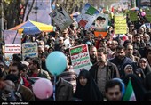 People in Iran's Capital Participate in Revolution Anniversary Rallies 