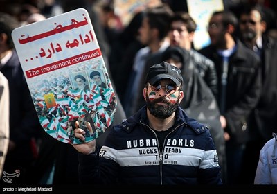 People in Iran's Capital Participate in Revolution Anniversary Rallies 