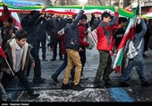 People in Iran's Capital Participate in Revolution Anniversary Rallies 
